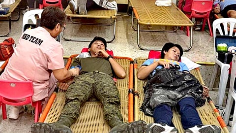 ILOILO. Soldiers from the 12th Infantry (Lick ’Em) Battalion donate blood during a Philippine Red Cross bloodletting activity in Barangay Banica, Roxas City, Capiz on February 14, 2026.