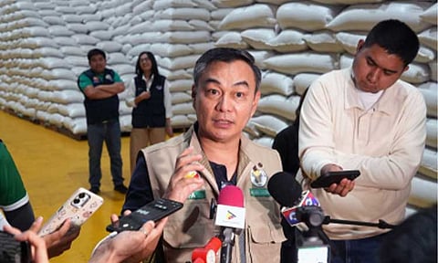 TARGET AUCTION ADJUSTMENTS. National Food Authority Administrator Larry Lacson inspects a warehouse in Cabanatuan, Nueva Ecija on Oct. 17, 2025. The NFA is planning to impose adjustments for its rice auctions in 2026 to ensure a faster and more efficient system. (PNA file photo)