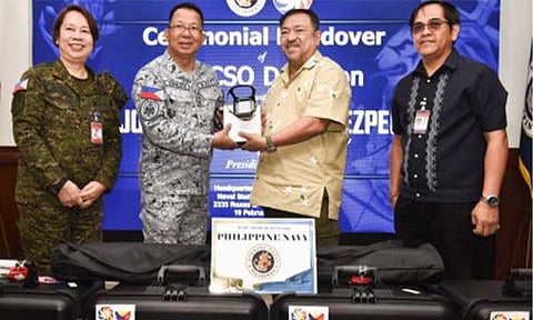 CUTTING EDGE. Philippine Charity Sweepstakes Office (PCSO) General Manager Mel Robles (2nd from right) turns over five ultra-modern portable AI X-ray units to the Philippine Navy (PN), represented by Vice Admiral Jose Ma. Ambrosio Ezpeleta, during a simple handover ceremony on Thursday (Feb. 19, 2026) at PN headquarters in Manila. The X-ray units are designed for use aboard sea-borne vessels during emergency situations. (Photo courtesy of PCSO)