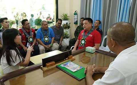 ZAMBOANGA. Department of Social Welfare and Development (DSWD) Sec. Rex Gatchalian (2nd from right) emphasizes the importance of strong cooperation between the National Government and local governments to expedite service delivery during his visit Monday, February 23, to Talusan, Zamboanga Sibugay.