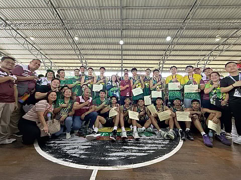 CHAMPIONS ANEW. Davao City Durians celebrate their championship victory at the 2026 Davraa Meet on Friday, February 27, at the Rotary Gym in Tagum City. The Dabawenyos defeated the Davao de Oro Golden Thunderbolts 71-50 and will aim to defend their Palarong Pambansa title in Agusan del Sur.