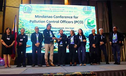 Atty. Noel Tomonglay (fourth from left), head of FDC Misamis’ Health, Safety, Security, and Environmental Department, received the award, along with Pollution Control Officers Ms. Kristine Tiziana D. Janolino (fifth from left) and Ms. Brenda M. Quinol (sixth from left).