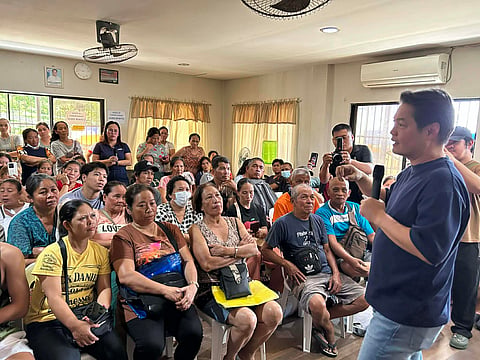 BACOLOD. Bacolod City Lone District Representative Alfredo Abelardo Benitez provides P1 million cash assistance to at least 189 families who lost their homes in a fire in Purok Katilingban 1 and 2, Barangay 39, Bacolod City on February 27, 2026.