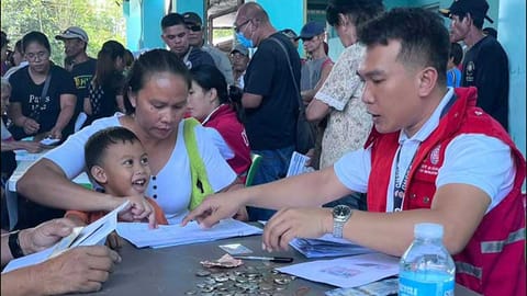 DSWD 6 distributes emergency cash aid to 1,159 typhoon-hit families