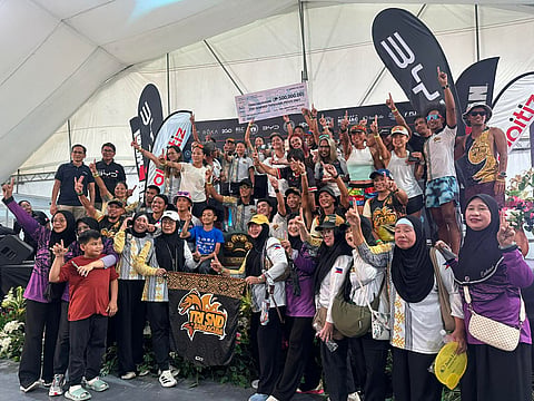 TRIBUNG MAISUGON AGAIN! Tri SND Barracuda celebrates on stage after winning the Tribu Maisugon team championship for the third consecutive year at the BYD Ironman 70.3 Davao on March 22, 2026. The team earned 38,126.8 points and a P500,000 cash prize.