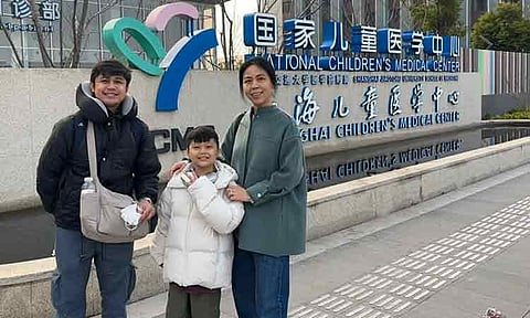 TREATMENT DONE. Drexel and Dezier Grye Daclan with Dr. Jiaoyang Cai of the Shanghai Children’s Medical Center (SCMC). Dr. Cai facilitated the admission and the Chimeric Antigen Receptor T (CAR T) cell infusion on Grye with the SCMC Innovative
Diagnosis and Treatment Department, as he has been battling an aggressive type of blood cancer for the past four years. Grye is the first in Mindanao to get such cancer treatment.