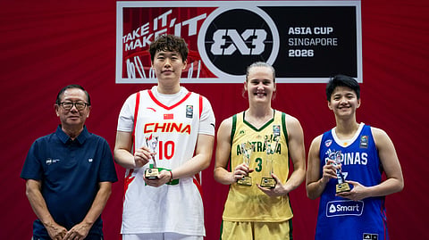 TEAM OF THE TOURNAMENT. Australia’s Kristy Wallace (center) holds her MVP trophy alongside China’s Zhang Zhiting (left) and the Philippines’ Kacey Dela Rosa after being named to the FIBA 3x3 Asia Cup 2026 Women’s Team of the Tournament in Singapore on Sunday, April 5, 2026. Wallace led Australia to the title with a dominant final win.