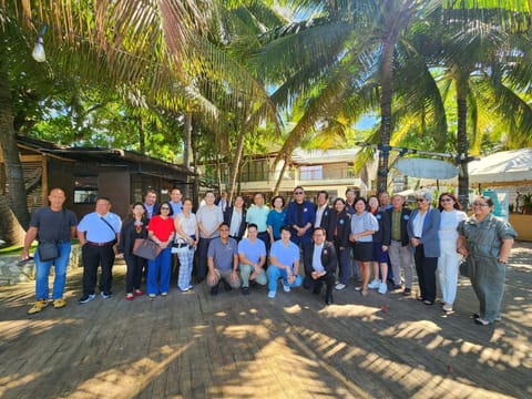 Government and private sector leaders, including AIC Airports, gather with Leo Tereso Magno of the Mindanao Development Authority (MinDA) during a consultative dialogue in Cagayan de Oro City to strengthen partnerships for Mindanao’s development.