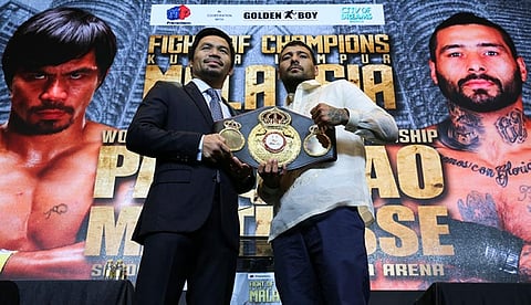 MANILA. Senator and boxing hero Manny Pacquiao, left, and Argentine WBA welterweight champion Lucas Matthysse pose for photographers as they hold the WBA welterweight champion belt during a press conference in Manila, on Wednesday, April 18, 2018. (AP)