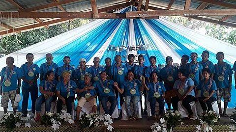 NEGROS. Officers and members of the Dama Farm Workers Agrarian Reform Beneficiaries Association, led by their president Daniel Diamante (standing, 6th from left), during the organization's 15th anniversary celebration held in Barangay Cabacungan, La Castellana, on June 4, 2018. (Erwin P. Nicavera)