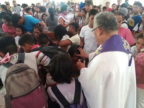 Demonic possession? Some students were brought to the church where a priest prayed for them. (Contributed Photo)
