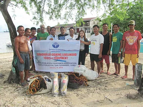 TURNOVER.Leaders of two fishermen's associations receive fishing gear from TCPI through Vanessa N. Bongcawil (fifth from right), head of community and general affairs. (Contributed photo)