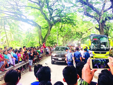 AMBUSH. Scene of the Crime Operation personnel inspect the crime scene in Sitio Katugasan in Barangay Perrelos, Carcar City, where PDEA 7 Agent Von Rian Tecson was ambushed yesterday noon. (Contributed photo / Jonreil Traya)