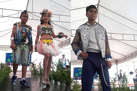 Trash in Fashion. Marie Ernestine School North Campus students take their trash to the catwalk, wearing outfits made of sacks, newspaper, plastic containers and other recyclables during their school's Trashion Show. (Contributed Foto)