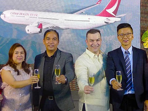DAVAO. Hazel Tagimacruz, District Sales & Marketing manager; Mark Pastrana Davao Airport Operations manager; Rob Bradshaw, Philippine Country manager; & Ronald Lam, Commercial & Cargo director. (Jinggoy I. Salvador)