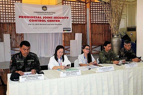 BACOLOD. Acting Negros Occidental Provincial Election Supervisor Salus Milagros Villanueva (center) Friday, January 11, 2019 convenes the Provincial Joint Security Control Center at the Provincial Capitol in Bacolod City, with (from left) Bacolod City police head Senior Superintendent Francisco Ebreo, Bacolod City election registrar Mavil Majarucon-Sia, 303rd Infantry Brigade commander Col. Benedict Arevalo, and Negros Occidental police head Senior Superintendent Romeo Baleros. (Photo courtesy of Bacolod City Police Office)