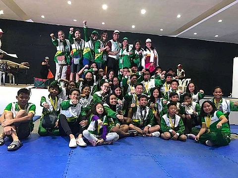 DAVAO. Members of the Davao City swimming team in a victory pose after harvesting a total of 47 gold medals, 34 silvers and 13 bronzes in the just-concluded Davraa Meet 2019 swimming competition held at Davao del Norte Sports and Tourism Complex in Tagum City. (Myra Grace Villanueva)