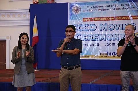 PAMPANGA. Mayor Edwin "EdSa" Santiago greets completers of the city government's Early Childhood Care and Development (ECCD) program for 2019 during the first leg of moving-up ceremonies on March 25 at Heroes Hall. With him is CSWD Officer Aileen Villanueva and Councilor Tino Dizon. (Photo contributed by CSF-CIO)