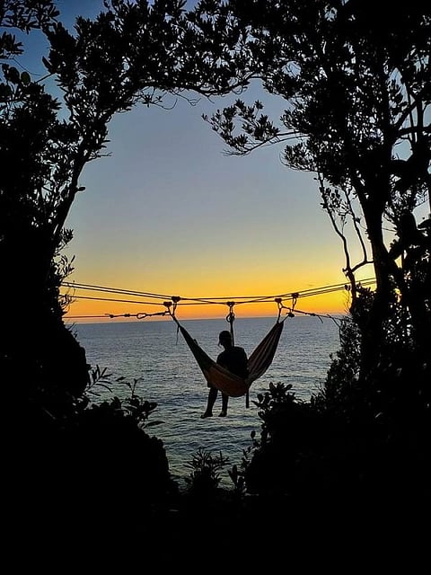 EASTERN SAMAR. The panoramic view of the Pacific sunset atop a hammock through the Huplag Adventure in Ando Island off Borongan City, the newest playground of Eastern Visayas. (Photo courtesy of Eleazar Labtic)
