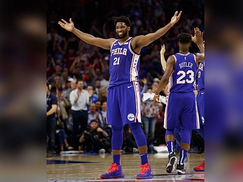 Philadelphia 76ers' Joel Embiid, of Cameroon, reacts to his basket during the first half in Game 5 of a first-round NBA basketball playoff series against the Brooklyn Nets, Tuesday, April 23, 2019, in Philadelphia. (AP)