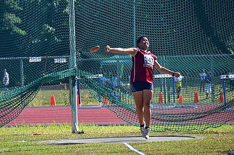 DAVAO. Khessie Jane Baluyot of Digos City gives her best effort to win Davao Region's first medal yesterday in secondary girls discus throw event of the Palarong Pambansa 2019 at the University of Mindanao (UM) track oval in Davao City. (Macky Lim)