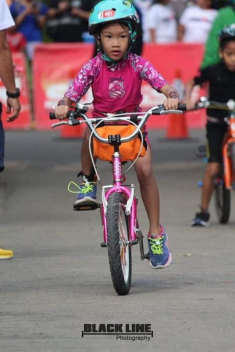 Franklin's daughter Geo Macca also displayed her interest in sports where she competed for the Alaska Iron Kid in Mactan, Cebu. With them are his partner Bang Agustin. (Contributed photo)