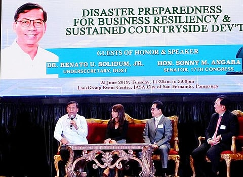 PAMPANGA. Science and Technology Undersecretary Renato Solidum Jr. talks about the importance of disaster preparedness as the key to business resiliency during PamCham's 63rd GMM at the LausGroup Event Centre. Listening are Sen. Sonny Angara's chief of staff Fatima Lipp Panontongan, PamCham president Rene Romero and PamCham chairman Jess Nicdao. - JTD