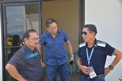 NEGROS. Agriculture Secretary Emmanuel Piñol (left) with Provincial Agriculturist Japhet Masculino (center) and NFA-Negros Occidental Provincial Manager Frisco Canoy (right) during his visit at the Rice Processing Complex in Barangay Tabunan, Bago City last year. (File photo)