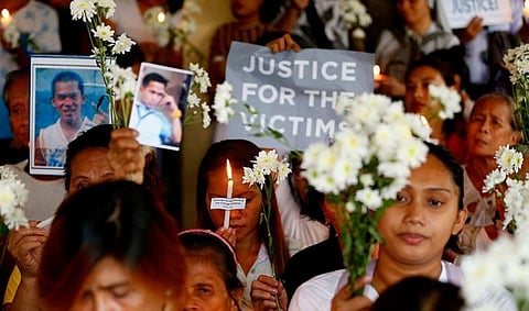 MANILA. In this March 17, 2019, file photo, relatives of victims in President Rodrigo Duterte's so-called war on drugs hold a memorial for their loved ones at a church in Manila.