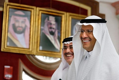 SAUDI ARABIA. Energy Minister Prince Abdulaziz bin Salman, right, and Aramco CEO Amin Al-Nasser smile as they leave a press conference in Jiddah, Saudi Arabia, Tuesday, September 17, 2019. Saudi Arabia's energy minister said Tuesday that 50 percent of its daily crude oil production that was knocked out by a weekend attack had been restored and that full production is expected by the end of the month. (AP)