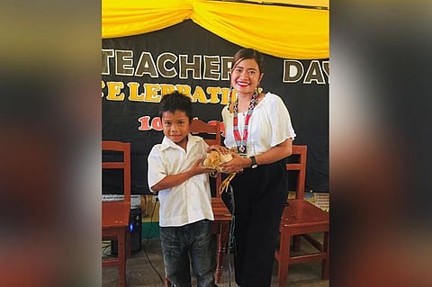 GENERAL SANTOS. Claude Talon, a Department of Education (Deped) teacher in General Santos City, thought a student was joking when he asked her if he could bring a chicken as a present on Teacher's Day. (Photo from Talon Claude Facebook)