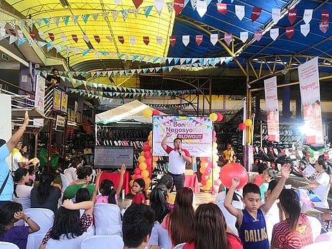 DAVAO. BPI Direct BanKo's head of Microfinance Loan Rodolfo Mabiasen Jr. conducted financial resiliency training to Dabawenyo self-employed, micro entrepreneurs at Bankerohan Public Market on October 22, 2019. (Ace Perez)