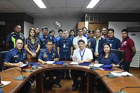 PAMPANGA. Angeles City Police Director Joyce Patrick Sangalang and Angeles University Foundation university president Joseph Angeles lead the signing of memorandum of agreement on the school's enhancement of its criminology program. (Contributed photo)