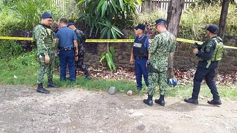 CAGAYAN DE ORO. Investigators are collecting pieces of evidence at the area where the 16-year-old pregnant girl was shot by unidentified motorcycle-riding gunmen across the Hall of Justice on Mastersons Avenue, Upper Carmen, Cagayan de Oro City, Tuesday. (Photo courtesy of Cocpo)