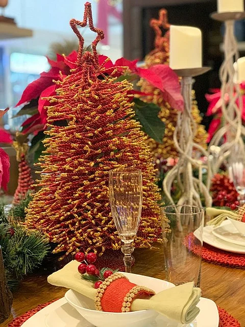 A favorite home accessory for the holidays, tabletop Christmas tree made of t'nalak fibers and wires. (Photo by Jinggoy I. Salvador)