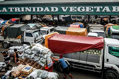 BAGUIO. La Trinidad Vegetable Trading Post is busier than ever due to the high demand of vegetables this holiday season. Some 41 trucks were given temporary exemption from the truck ban ordinance of Baguio City from December 18 to 30, 2019. (Jean Nicole Cortes)