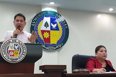 PAMPANGA. Angeles City Councilor Jay Sangil delivers his privilege speech in which emphasized that he will uphold public interest and the rights of water consumers during Tuesday's (January 28) City Council session. Listening is Vice Mayor Vicky Vega-Cabigting. (Chris Navarro)