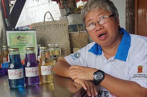AKLAN. Boracay Island Producers Cooperative president Desiree Segovia talks about the love potions they had produced in Boracay. (Jun N. Aguirre)
