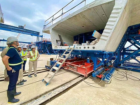 PAMPANGA. Fidel Cruz, DoTr assistant secretary for Railways, inspects precast segments of the PNR Clark Phase 1 which construction is now in full swing. (Contributed photo)