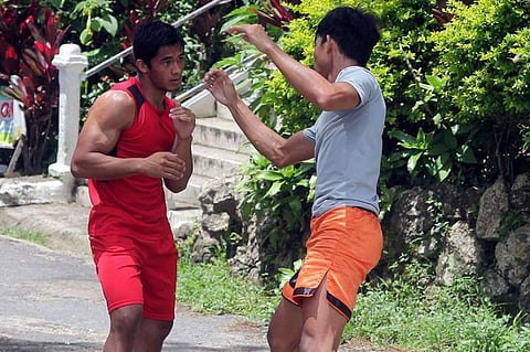 BAGUIO. Hoping to defend his world bantamweight title in Brave Combat Federation soon here in the Philippines, Stephen Loman stays active with his Team Lakay fighters joining them in a morning skirmish at the Lourdes Grotto in Baguio City. (Roderick Osis)