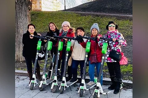 NORWAY. Posing on scooters at the Oslo Park are: Emma, Gladys, Zeny, Janet, Genie, and the author. (Photo by Debb Bautista)