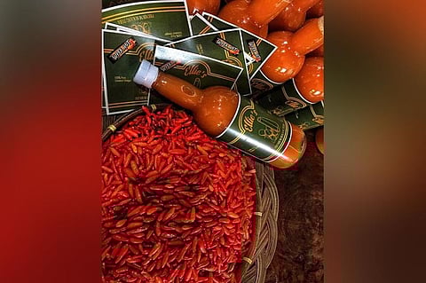 Ellie's Premium Sukang Tuba and the Bird's Eye chili (Photo by Henry Tejamo)