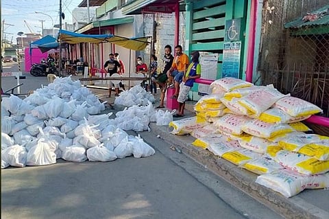 ZAMBOANGA. The City Social Welfare and Development Office started Thursday, May 7, the second wave of relief operations amid the coronavirus disease (Covid-19) crisis. Photo handout shows food packs and sacks of rice are distributed in Zone 1 village, the pilot area of the relief operations. (SunStar Zamboanga)