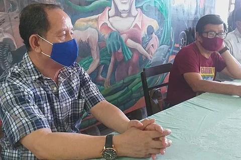 Labor representatives to the Regional Tripartite Wages and Productivity Board in Western Visayas Wennie Sancho (center) and Hernane Braza (left) will push for a wage increase for workers in the region amid the Covid-19 pandemic. (Erwin Nicavera)