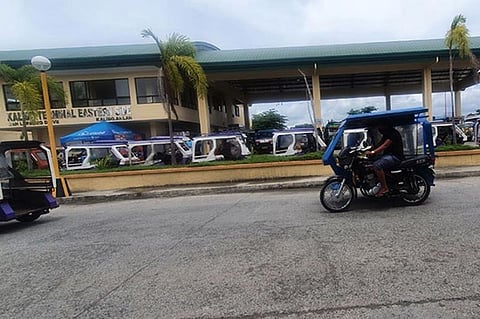 ILOILO. A tricycle passing through a public terminal in Kalibo, Aklan. The Municipal Council has now opened the franchise renewal for tricycle units. (Jun N. Aguirre)