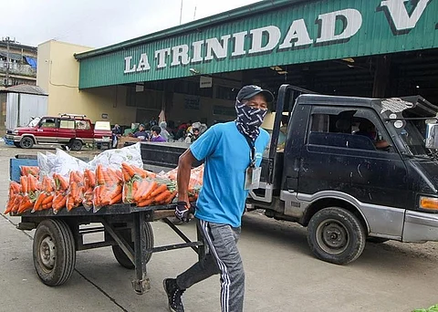 TRADING RESUMES. After three days of total lockdown and thorough disinfection, the La Trinidad Vegetable Trading post reopened Monday, June 15. La Trinidad Mayor Romeo Salda ordered the lockdown after a truck driver and helper were infected with the new coronavirus. Photo by Jean Nicole Cortes