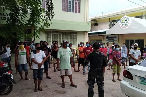 ILLEGAL COCKFIGHT. Around 53 residents from Barangay Kal-anan, Tabogon town, were arrested on June 29, 2020 after they were caught holding an illegal cockfight. Also arrested was the barangay chief who allowed the cockpit to operate. (Cebu Provincial Police Office)