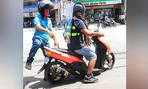 CEBU. Lapu-Lapu City resident Richard Armamento says he will present to the City Government and the Inter-Agency Task Force for the Management of Emerging Infectious Diseases a prototype of the motorcycle barrier that he developed. His design costs P2,700. (Photo by Amper Campaña)