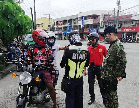NO BARRIER. The Bacolod Traffic Authority Office (BTAO) arrest 86 violators of the new back-riding policy for failure to install barriers as part of the measures to protect riders against coronavirus disease (Covid-19). BTAO photo