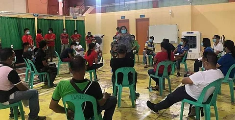 BACOLOD. Dr. Luz Ma-apni, head of Contact Tracing Operations Center, trains the team leaders of barangay contact tracing team at the BRO Center at the BAYS Center. (Contributed photo)
